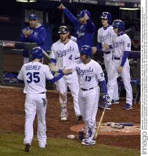 Oct. 28, 2015 - Kansas City, MO, USA - The Kansas City Royals Eric Hosmer (35) is welcomed back to the dugout after scoring on a single by Mike Moustakas in the fifth inning against the New York Mets during Game 2 of the World Series on Wednesday, Oct. 28, 2015, at Kauffman Stadium in Kansas City, Mo. World Series: NY Mets at Kansas City, Game 2 - ZUMAm67_