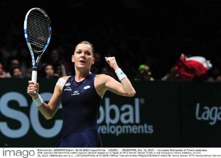 (151031) -- SINGAPORE, Oct. 31, 2015 -- Agnieszka Radwanska of Poland celebrates after winning the semi-final match against Garbine Muguruza of Spain at WTA Tennis Damen Finals in the Singapore Indoor Stadium, on Oct. 31, 2015. Radwanska won 2-1. ) (SP)SINGAPORE-WTA-SEMI-FINALS ThenxChihxWey 