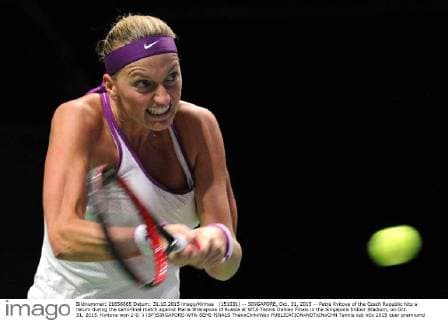 (151031) -- SINGAPORE, Oct. 31, 2015 -- Petra Kvitova of the Czech Republic hits a return during the semi-final match against Maria Sharapova of Russia at WTA Tennis Damen Finals in the Singapore Indoor Stadium, on Oct. 31, 2015. Kvitova won 2-0. ) (SP)SINGAPORE-WTA-SEMI-FINALS ThenxChihxWey 
