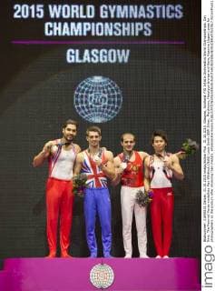 31.10.2015. Glasgow, Scotland. FIG Artistic Gymnastics World Championships. Day Nine. The Pommel Horse medallists Max Whitlock (Gold) Louis Smith GBR-Silver, Merdinyan, Harutyun bronze and Kaya, Kazuma (Japan) pose for photographers on the podium after receiving their medals. xRolandxHarrisonx  ActionPlus11677854