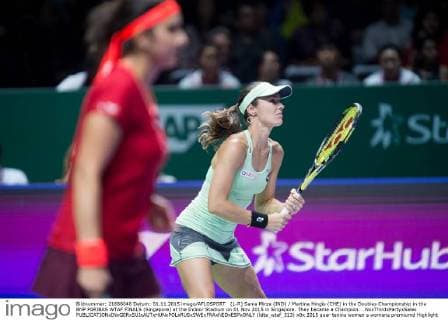(L-R) Sania Mirza (IND) Martina Hingis (CHE) in the Doubles Championship in the BNP PARIBAS WTAF FINALS (Singapore) at the Indoor Stadium on 01 Nov 2015 in Singapore. They became a Champion. . NoxThirdxPartyxSales  (ldta_wtaf_313)