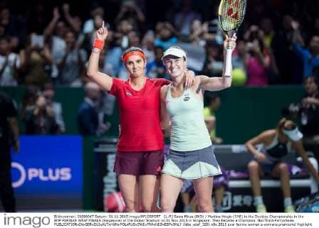 (L-R) Sania Mirza (IND) Martina Hingis (CHE) in the Doubles Championship in the BNP PARIBAS WTAF FINALS (Singapore) at the Indoor Stadium on 01 Nov 2015 in Singapore. They became a Champion. NoxThirdxPartyxSales  (ldta_wtaf_320)
