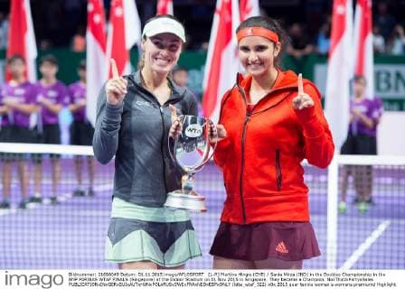 (L-R) Martina Hingis (CHE) Sania Mirza (IND) in the Doubles Championship in the BNP PARIBAS WTAF FINALS (Singapore) at the Indoor Stadium on 01 Nov 2015 in Singapore. They became a Champion. NoxThirdxPartyxSales  (ldta_wtaf_322)