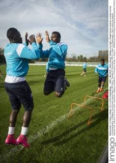 - GENT, BELGIUM: Gent s Serge Tabekou and Gent s Moses Simon pictured in action during a training session of Belgian first division soccer team KAA Gent, Tuesday 03 November 2015, in Gent. On Wednesday, Gent is playing against Spanish club Valencia CF in the UEFA Champions League competition, in the group stage, in group H. JASPERxJACOBS  x04732679x