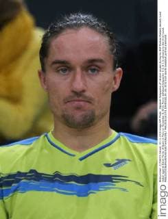 Alexandr Dolgopolov of Ukraine pauses during his BNP Paribas Masters second round match against David Ferrer of Spain in Paris on November 3, 2015. Ferrer defeated Dolgopolov 6-2, 6-2 to advance to the third round.  PAR20151103701 DAVIDxSILPA