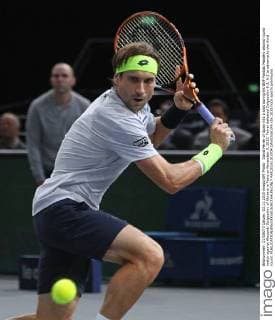 David Ferrer of Spain hits a shot during his BNP Paribas Masters second round match against Alexandr Dolgopolov of Ukraine in Paris on November 3, 2015. Ferrer defeated Dolgopolov 6-2, 6-2 to advance to the third round.  PAR20151103704 DAVIDxSILPA