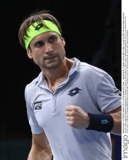 David Ferrer of Spain reacts after a shot during his BNP Paribas Masters second round match against Alexandr Dolgopolov of Ukraine in Paris on November 3, 2015. Ferrer defeated Dolgopolov 6-2, 6-2 to advance to the third round.  PAR20151103707 DAVIDxSILPA