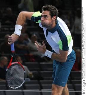 Jeremy Chardy of France hits a serve during his BNP Paribas Masters first round match against Lucas Pouille of France in Paris on November 3, 2015. Chardy defeated Pouille 3-6, 6-3, 6-2 to advance to the second round.  PAR20151103717 DAVIDxSILPA