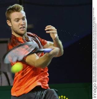 American Jack Sock hits a shot during his BNP Paribas Masters first round match against Viktor Troicki of Serbia in Paris on November 3, 2015. Troicki defeated Sock 6-2, 6-3 to advance to the second round.  PAR20151103727 DAVIDxSILPA