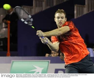 American Jack Sock hits a shot during his BNP Paribas Masters first round match against Viktor Troicki of Serbia in Paris on November 3, 2015. Troicki defeated Sock 6-2, 6-3 to advance to the second round.  PAR20151103731 DAVIDxSILPA