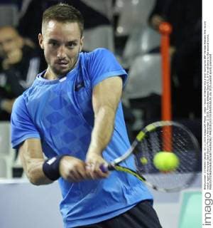 Viktor Troicki of Serbia hits a shot during his BNP Paribas Masters first round match against American Jack Sock in Paris on November 3, 2015. Troicki defeated Sock 6-2, 6-3 to advance to the second round.  PAR20151103733 DAVIDxSILPA
