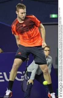American Jack Sock hits a shot during his BNP Paribas Masters first round match against Viktor Troicki of Serbia in Paris on November 3, 2015. Troicki defeated Sock 6-2, 6-3 to advance to the second round.  PAR20151103738 DAVIDxSILPA