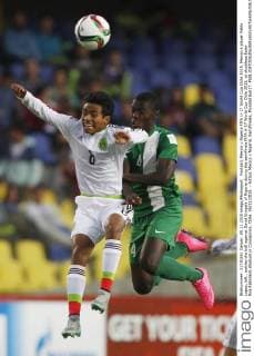 Football, Mexico v Nigeria FIFA U-17 World Cup Chile 2015. Mexico s player Pablo Lopez, left , battles the ball against David Enogela of Nigeria during the semifinals FIFA U-17 World Cup Chile 2015, at alcaldesa Ester Roa Rebolledo stadium in Concepcion, Chile. 05 11 2015. - Futbol, Mexico v Nigeria. Semifinales, Mundial Sub17. 
