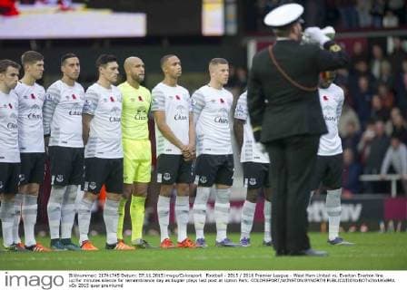 Football - 2015 2016 Premier League - West Ham United vs. Everton Everton line up for minutes silence for remembrance day as bugler plays last post at Upton Park. COLORSPORT WINSTON BYNORTH 