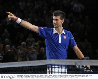 Novak Djokovic of Serbia reacts after winning his finals match against Andy Murray of Great Britain at the BNP Paribas Masters in Paris on November 8, 2015. Djokovic defeated Murray 6-2, 6-4 to win his fourth Masters title in Paris.  PAR20151108731 DAVIDxSILPA