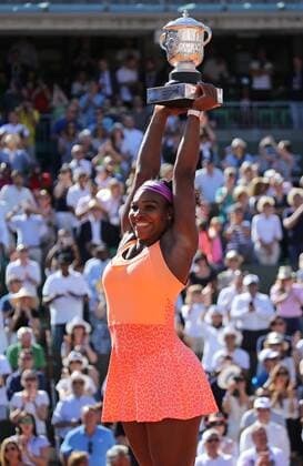 American Serena Williams holds the championship trophy after winning her French Open women s final match against Lucie Safarova of the Czech Republic at Roland Garros in Paris on June 6, 2015. Williams defeated Safarova 6-3, 6-7 (2), 6-2 to win her third French Open title.  POY2015S046 DAVIDxSILPA