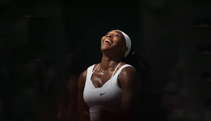 American Serena Williams smiles after winning the Women s Singles Final against Spain s Garbine Muguruza on day twelve of the 2015 Wimbledon championships, London on July 11, 2015. Williams won the match 6-4, 6-4.  POY2015S074 HUGOxPHILPOTT