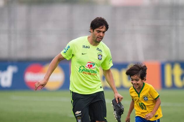 Training Selection Home Brazilian Sao Paulo, Brazil - 10 11 2015: SELECTION TRAINING HOME BRAZILIAN - Kaka playing with his son Luca and a colleague during training the Brazilian Principal Selection held at CT Joaquim Grava Corinthians. (Photo: Fe Reis FotoArena)  FexReis