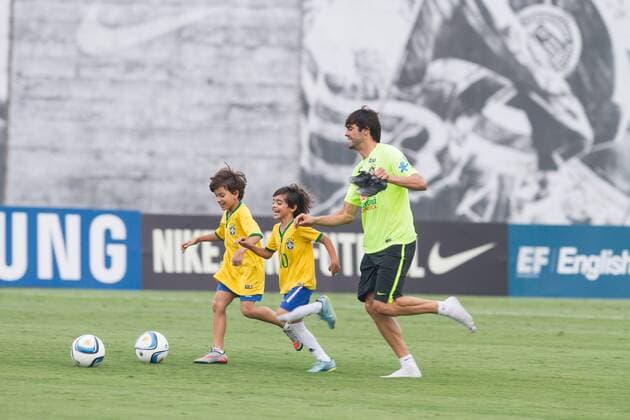 Training Selection Home Brazilian Sao Paulo, Brazil - 10 11 2015: SELECTION TRAINING HOME BRAZILIAN - Kaka playing with his son Luca and a colleague during training the Brazilian Principal Selection held at CT Joaquim Grava Corinthians. (Photo: Fe Reis FotoArena)  FexReis