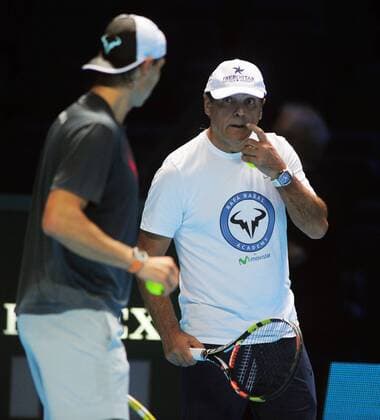 Tennis - 2015 ATP Tennis Herren World Tour Finals at The O2 - Pre-Tournament Media Day Rafael Nadal of Spain training on the main court with his coach, Uncle Tony 