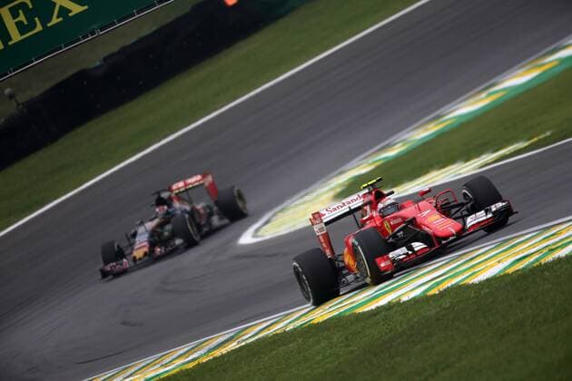 Brazilian Grand Prix, Sao Paulo 12 - 15 November 2015 13.11.2015 - Free Practice 1, Kimi Raikkonen (FIN) Scuderia Ferrari SF15-T and Max Verstappen (NED) Scuderia Toro Rosso STR10 