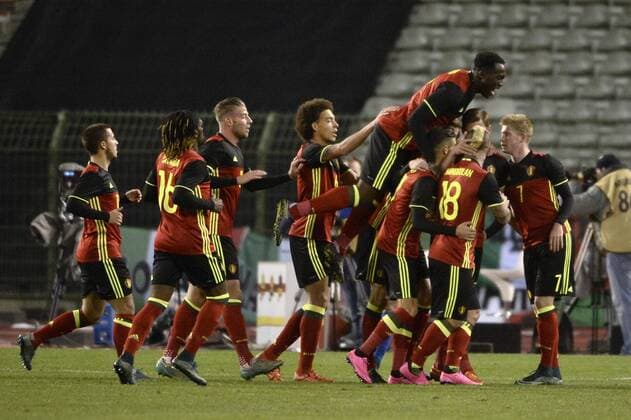- BRUSSELS, BELGIUM: Belgium s Jan Vertonghen (hidden) celebrates with his teammates after scoring the 1-91 goal during a friendly soccer game between Belgian national team Nationalteam Red Devils and Italy, in Brussels, Friday 13 November 2015, a game in preparation of the Euro2016 European Championship EM Europameisterschaft VIRGINIExLEFOUR  x04739596x