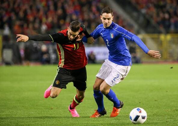 - BRUSSELS, BELGIUM: Belgium s Yannick Ferreira Carrasco and Italy s Mattia De Sciglio fight for the ball during a friendly soccer game between Belgian national team Nationalteam Red Devils and Italy, in Brussels, Friday 13 November 2015, a game in preparation of the Euro2016 European Championship EM Europameisterschaft VIRGINIExLEFOUR  x04739606x