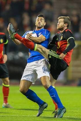 - BRUSSELS, BELGIUM: Italy s Graziano Pelle and Belgium s Nicolas Lombaerts fight for the ball during a friendly soccer game between Belgian national team Nationalteam Red Devils and Italy, in Brussels, Friday 13 November 2015, a game in preparation of the Euro2016 European Championship EM Europameisterschaft BRUNOxFAHY  x04739626x