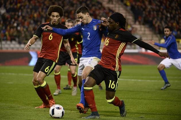 - BRUSSELS, BELGIUM: Belgium s Axel Witsel, Italy s Mattia De Sciglio and Belgium s Luis Pedro Cavanda fight for the ball during a friendly soccer game between Belgian national team Nationalteam Red Devils and Italy, in Brussels, Friday 13 November 2015, a game in preparation of the Euro2016 European Championship EM Europameisterschaft DIRKxWAEM  x04739631x