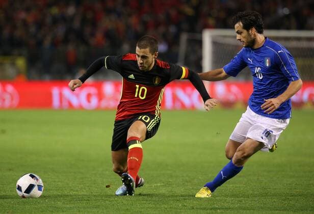 - BRUSSELS, BELGIUM: Belgium s Eden Hazard and Italy s Marco Parolo fight for the ball during a friendly soccer game between Belgian national team Nationalteam Red Devils and Italy, in Brussels, Friday 13 November 2015, a game in preparation of the Euro2016 European Championship EM Europameisterschaft VIRGINIExLEFOUR  x04739641x