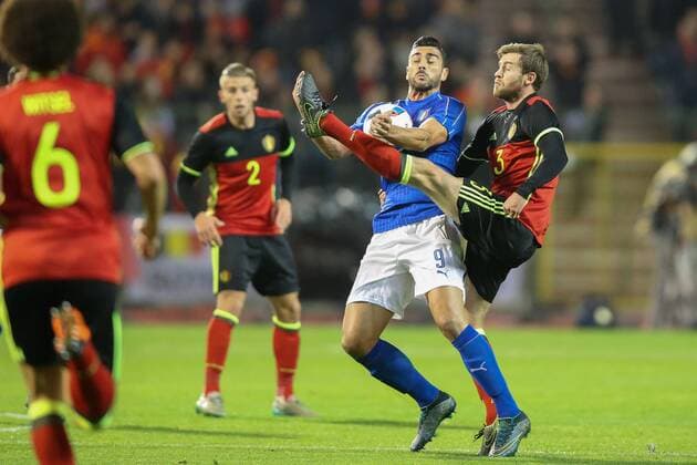 - BRUSSELS, BELGIUM: Italy s Graziano Pelle and Belgium s Nicolas Lombaerts fight for the ball during a friendly soccer game between Belgian national team Nationalteam Red Devils and Italy, in Brussels, Friday 13 November 2015, a game in preparation of the Euro2016 European Championship EM Europameisterschaft BRUNOxFAHY  x04739624x