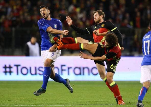 - BRUSSELS, BELGIUM: Italy s Graziano Pelle, Belgium s Nicolas Lombaerts and Belgium s Axel Witsel fight for the ball during a friendly soccer game between Belgian national team Nationalteam Red Devils and Italy, in Brussels, Friday 13 November 2015, a game in preparation of the Euro2016 European Championship EM Europameisterschaft VIRGINIExLEFOUR  x04739672x