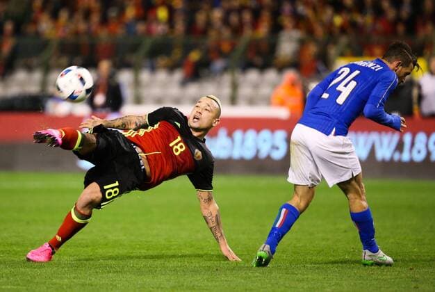 - BRUSSELS, BELGIUM: Belgium s Radja Nainggolan and Italy s Alessandro Florenzi fight for the ball during a friendly soccer game between Belgian national team Nationalteam Red Devils and Italy, in Brussels, Friday 13 November 2015, a game in preparation of the Euro2016 European Championship EM Europameisterschaft VIRGINIExLEFOUR  x04739674x