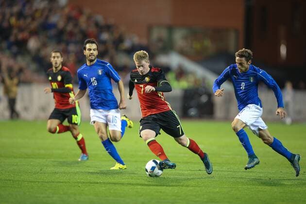 - BRUSSELS, BELGIUM: Italy s Marco Parolo, Belgium s Kevin De Bruyne and Italy s Claudio Marchisio fight for the ball during a friendly soccer game between Belgian national team Nationalteam Red Devils and Italy, in Brussels, Friday 13 November 2015, a game in preparation of the Euro2016 European Championship EM Europameisterschaft BRUNOxFAHY  x04739723x
