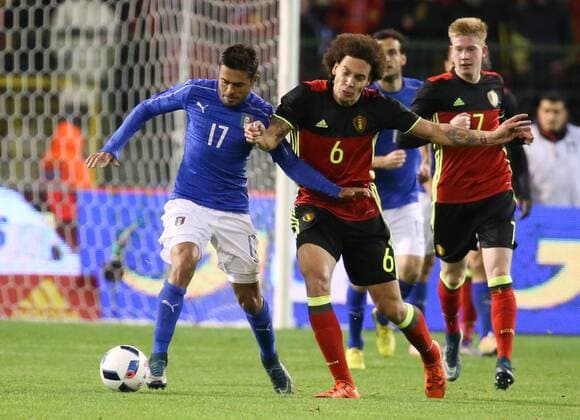 - BRUSSELS, BELGIUM: Italy s Eder and Belgium s Axel Witsel fight for the ball during a friendly soccer game between Belgian national team Nationalteam Red Devils and Italy, in Brussels, Friday 13 November 2015, a game in preparation of the Euro2016 European Championship EM Europameisterschaft VIRGINIExLEFOUR  x04739787x
