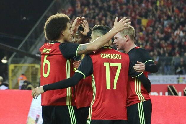 - BRUSSELS, BELGIUM: Belgium s Kevin De Bruyne (R) celebrates with Belgium s Axel Witsel and Yannick Ferreira Carrasco after scoring the 2-1 during a friendly soccer game between Belgian national team Nationalteam Red Devils and Italy, in Brussels, Friday 13 November 2015, a game in preparation of the Euro2016 European Championship EM Europameisterschaft BRUNOxFAHY  x04739853x