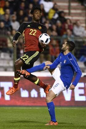 - BRUSSELS, BELGIUM: Belgium s Michy Batshuayi and Italy s Antonio Candreva fight for the ball during a friendly soccer game between Belgian national team Nationalteam Red Devils and Italy, in Brussels, Friday 13 November 2015, a game in preparation of the Euro2016 European Championship EM Europameisterschaft DIRKxWAEM  x04739854x