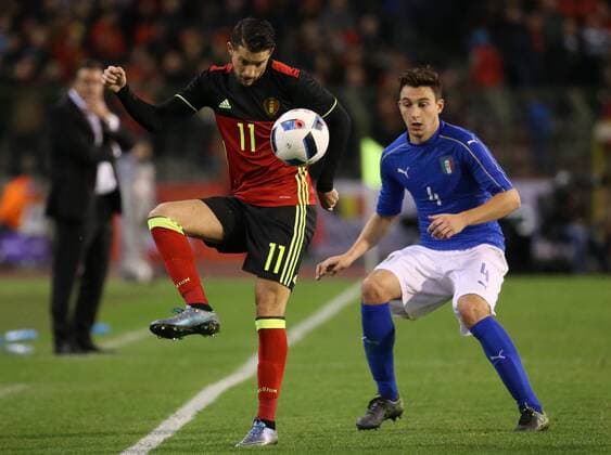 - BRUSSELS, BELGIUM: Belgium s Kevin Mirallas and Italy s Matteo Darmian fight for the ball during a friendly soccer game between Belgian national team Nationalteam Red Devils and Italy, in Brussels, Friday 13 November 2015, a game in preparation of the Euro2016 European Championship EM Europameisterschaft VIRGINIExLEFOUR  x04739883x
