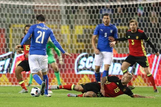 - BRUSSELS, BELGIUM: Italy s Roberto Soriano and Belgium s Radja Nainggolan fight for the ball during a friendly soccer game between Belgian national team Nationalteam Red Devils and Italy, in Brussels, Friday 13 November 2015, a game in preparation of the Euro2016 European Championship EM Europameisterschaft BRUNOxFAHY  x04739878x