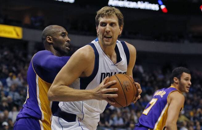 Nov. 13, 2015 - Dallas, TX, USA - The Los Angeles Lakers Kobe Bryant, left, pressures the Dallas Mavericks Dirk Nowitzki in the first period at the American Airlines Center in Dallas on Friday, Nov. 13, 2015. LA Lakers at Dallas - ZUMAm67_
