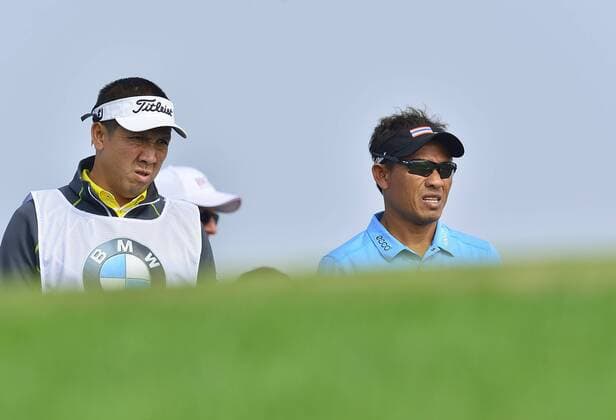 Nov. 14, 2015 - Shanghai, People s Republic of China - THONGCHAI JAIDEE of Thailand (R) in action during the round 3 of BMW Masters at Lake Malaren Golf Club in Shanghai. Golf 2015 - Shanghai Masters - Day 3  - ZUMAm119