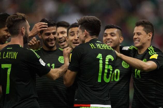 Players of Mexico celebrate after scoring during the 2018 World Cup qualifying match between Mexico and El Salvador at Azteca Stadium in Mexico City, capital of Mexico, on Nov. 13, 2015. Mexico won 3-0. Pedro Mera) (rhj) (SP)MEXICO-MEXICO CITY-SOCCER-MEXICO VS EL SALVADOR e PedroxMera 