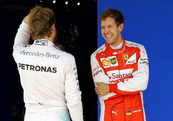 Brazil Grand Prix Formula 1 in 2015 SAO PAULO, Brazil - 11 14 2015: BIG FORMULA OF BRAZIL AWARD 1 2015 - Sebastian Vettel and Nico Rosberg, GER, during practice for the Brazil Grand Prix Formula 1 in 2015, held at the Interlagos circuit. (Photo: Rodolfo Buhrer La Picture FotoArena)  RodolfoxBuhrer