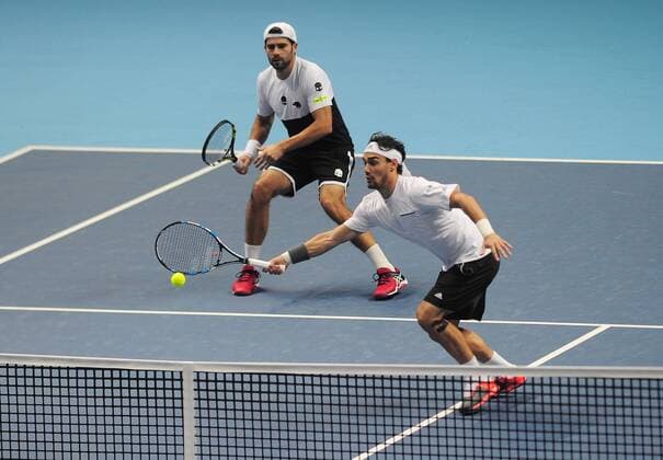 Tennis - 2015 ATP Tennis Herren World Tour Finals at The O2 - Day One Mens Doubles : Jamie Murray (GBR) and John Peers (AUS) vs. Simone Bolelli and Fabio Fognini (Italy) Simone Bolelli - behind and Fabio Fognini (Italy) COLORSPORT ANDREW COWIE 