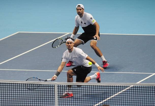 Tennis - 2015 ATP Tennis Herren World Tour Finals at The O2 - Day One Mens Doubles : Jamie Murray (GBR) and John Peers (AUS) vs. Simone Bolelli and Fabio Fognini (Italy) Simone Bolelli - behind and Fabio Fognini (Italy) COLORSPORT ANDREW COWIE 