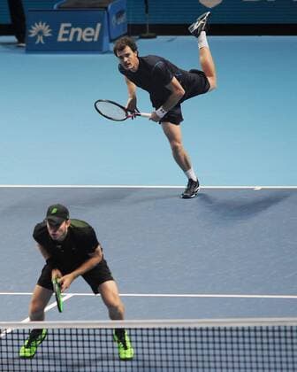 Tennis - 2015 ATP Tennis Herren World Tour Finals at The O2 - Day One Mens Doubles : Jamie Murray (GBR) and John Peers (AUS) vs. Simone Bolelli and Fabio Fognini (Italy) Jamie Murray (GBR) - behind and John Peers (AUS) COLORSPORT ANDREW COWIE 