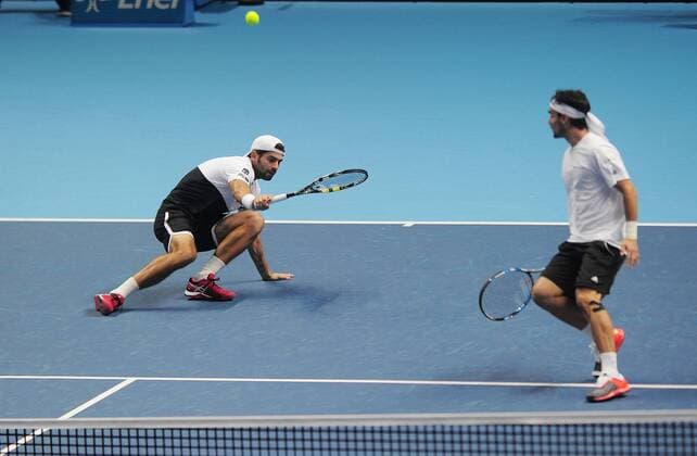 Tennis - 2015 ATP Tennis Herren World Tour Finals at The O2 - Day One Mens Doubles : Jamie Murray (GBR) and John Peers (AUS) vs. Simone Bolelli and Fabio Fognini (Italy) Simone Bolelli - left and Fabio Fognini (Italy) COLORSPORT ANDREW COWIE 