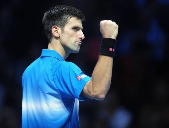 Tennis - 2015 ATP Tennis Herren World Tour Finals at The O2 - Day One Group : Stan Smith : Mens singles : Novak Djokovic (Serb) vs. Kai Nishikori (Jap) Novak Djokovic celebrates his win over Nishikori COLORSPORT ANDREW COWIE 