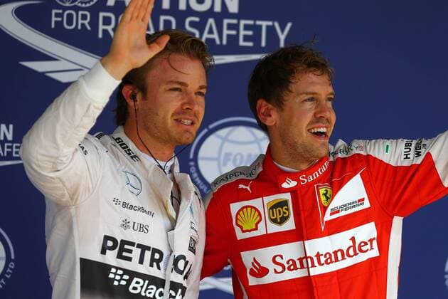 Brazilian Grand Prix, Sao Paulo 12 - 15 November 2015 14.11.2015 - Qualifying, Nico Rosberg (GER) Mercedes AMG F1 W06 pole position and 3rd position Sebastian Vettel (GER) Scuderia Ferrari SF15-T 