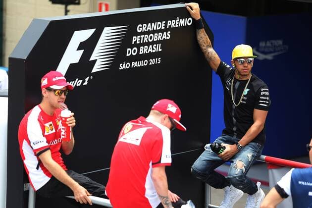Brazilian Grand Prix, Sao Paulo 12 - 15 November 2015 15.11.2015 - Lewis Hamilton (GBR) Mercedes AMG F1 W06, Sebastian Vettel (GER) Scuderia Ferrari SF15-T and Kimi Raikkonen (FIN) Scuderia Ferrari SF15-T at drivers parade 